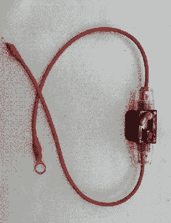 a red cyclindrical device that sits between and connects two red wires