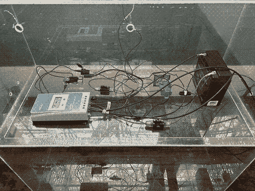 a close up image of all of the above components inside the clear acrylic case and connected with wires